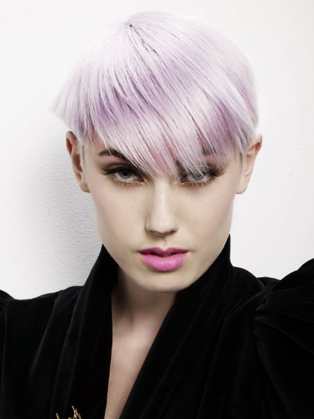 Short textured haircut with a purple hair color