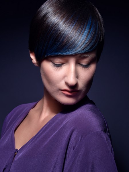 Short black hair with blue color accents