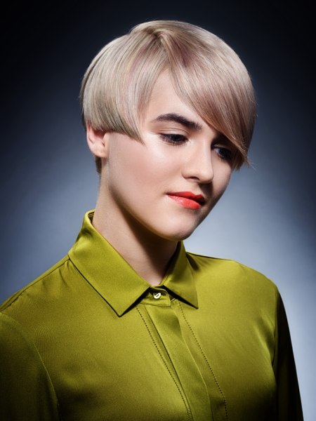 Short hair cut and a buttoned up blouse collar