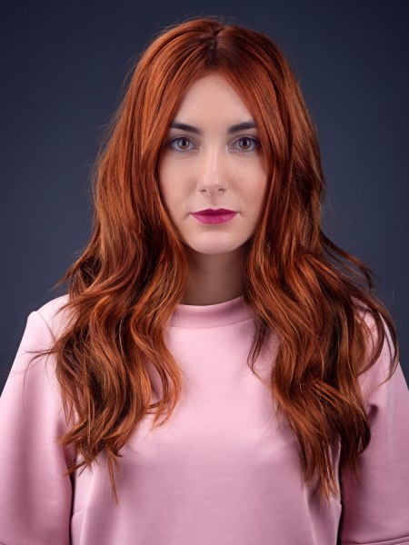 Long red hair with waves and loose tips