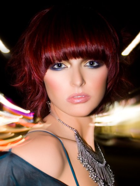 Short hairstyle with a rich and radiant red color