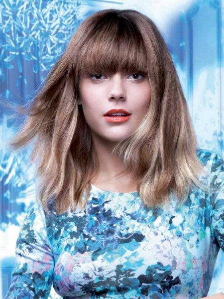 Long bob with highlights that accentuate movement