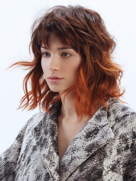 Shoulder-length hair with messy finger styling