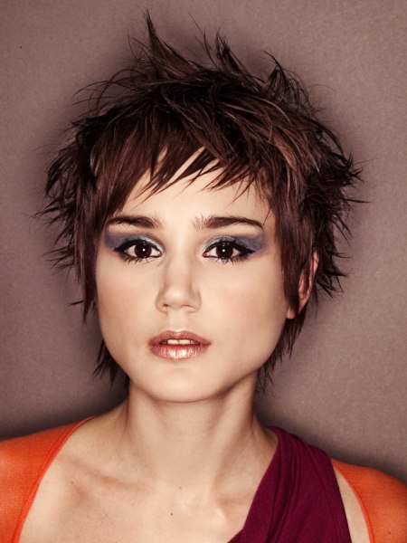 Pixie haircut with razor cutting