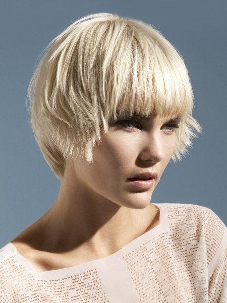 Short blonde haircut with textured sides