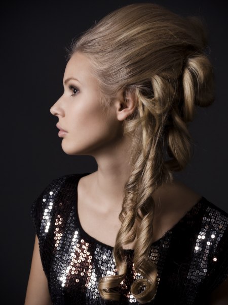 Partial up-style for long hair with sausage-roll coils