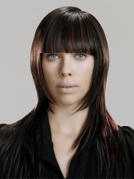 Long hairstyle with a blunt fringe and hair extensions