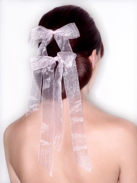 Ponytail bun bridal hair with shiny organza bows