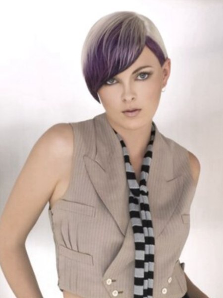 Bi-chromatic hairstyle tinted with a vibrant purple shade