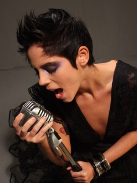 Post-punk haircut with sideburns for women