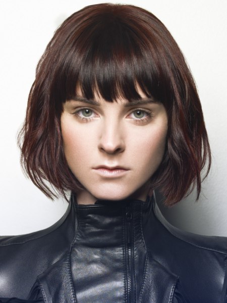 Brown bob cut with eyebrow-touching bangs