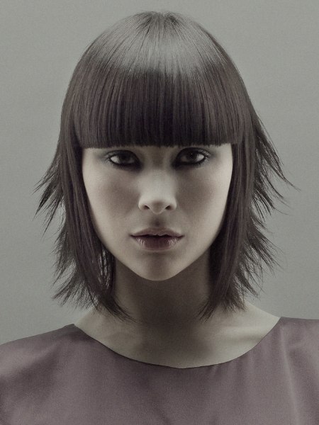 Neck-length bob with a blunt horizontal fringe