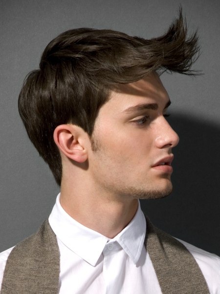 Modern boy's hairstyle with the hair directed forward