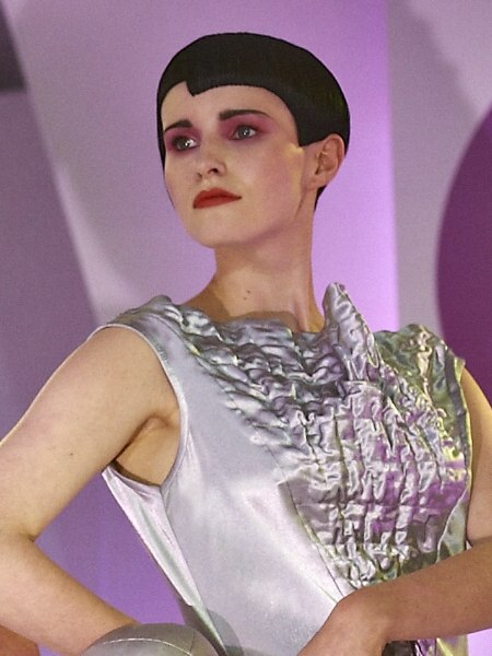 Short precision haircut for deep black hair