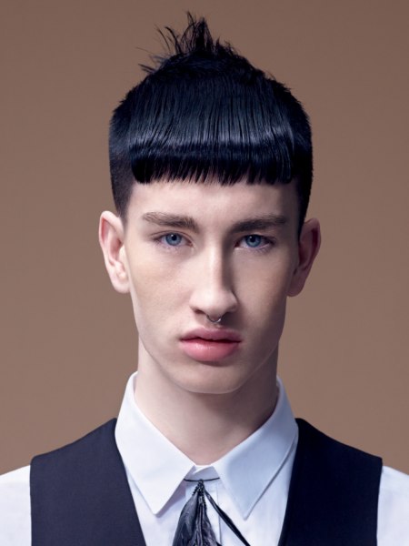 Mens haircut with a sleek fringe