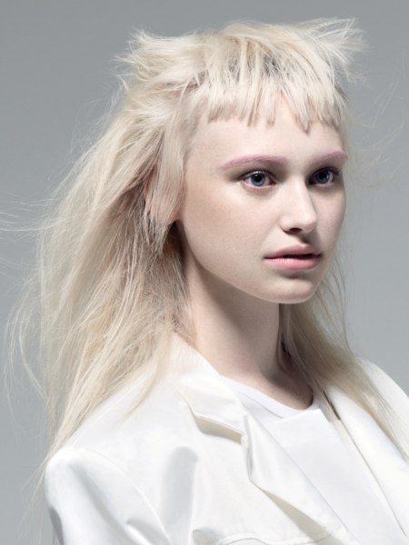 Long hair with a flared fringe