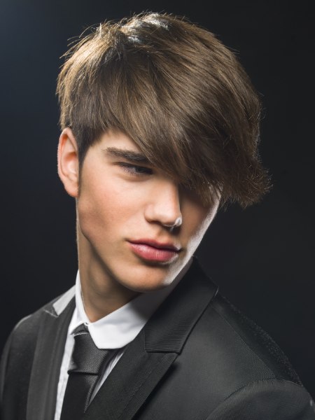 Men's haircut with long bangs