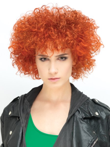 Orange hair with tiny curls and a round Afro shape