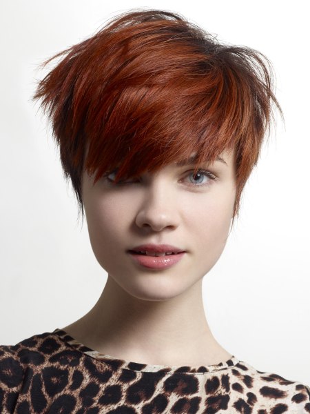 Short pixie cut with bangs for red hair
