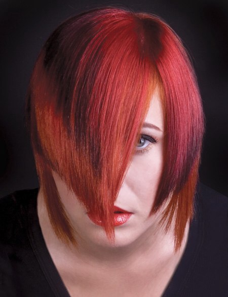 Short hairstyle with different tones of red hair