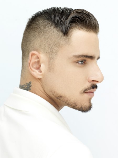 Men's hair with clipped sides and back