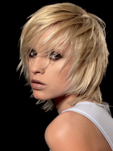 Blonde razor-cut shag with layers