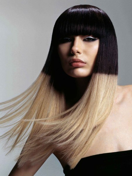 Dramatic hair coloring with a combination of black and blonde