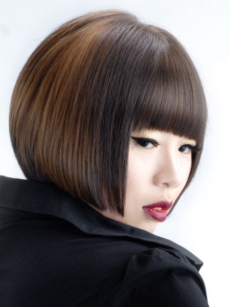 Asian hair cut into a smooth and chick stacked bob