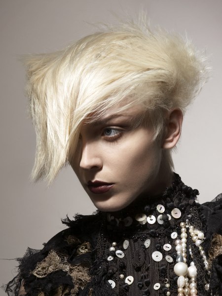 Short eye covering hairstyle for platinum blonde hair