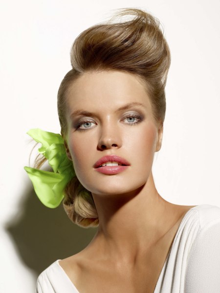 Evening hairstyle with a flower