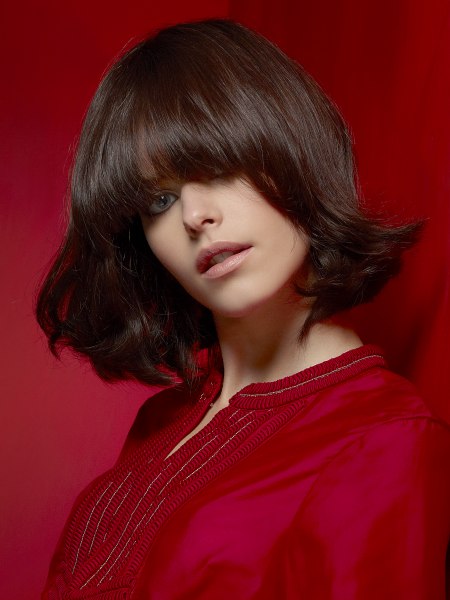 Medium-length bob with inward-curved bangs