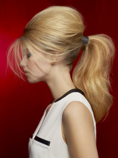 Long, high ponytail with a clasp