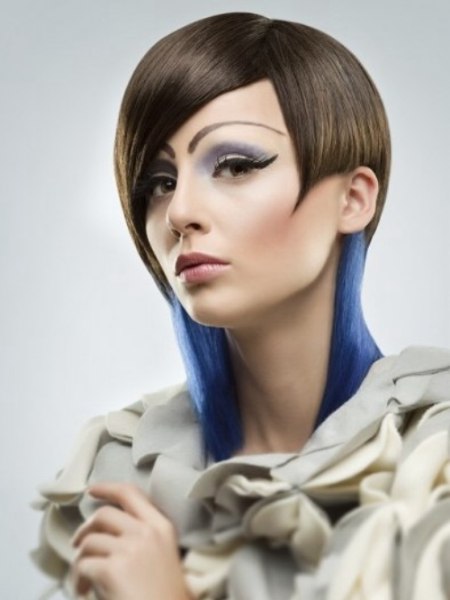 Brown hair with blue ends cut in a round style