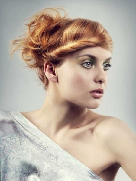 Hair styled up with a rolled fringe