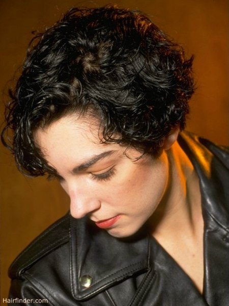 Hair with curls cut above the lobes of the ears