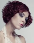 Curly hairstyle with a curved oval shape