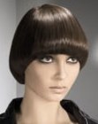 1970s Toni Tennille hairstyle with hair that encases the face
