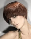 Short hairstyle that covers the eyebrows for red hair