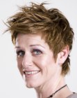 Carefree short hairstyle with finger styling for older women