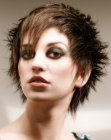 Spiky short hairdo with long textured bangs