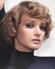 Short layered hair with curls and 1930s elements