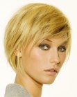 Short hairstyle with slithered strands along the sides of the face
