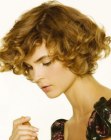 Bob haircut with layers and golden curls
