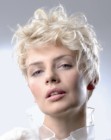 Short and curly blonde hair with textured sides and nape