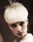 Modern short pageboy cut for platinum blonde hair