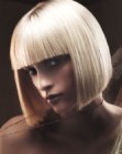 Timeless blonde bob with blunt cutting lines and bangs