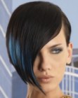 Short assymmetrical haircut with a drop shape