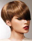 Short geometric hairstyle with deep bangs