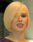 Short blonde bob with a clipper cut nape