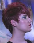 Short hairstyle with a cut out ear and longer hair on top